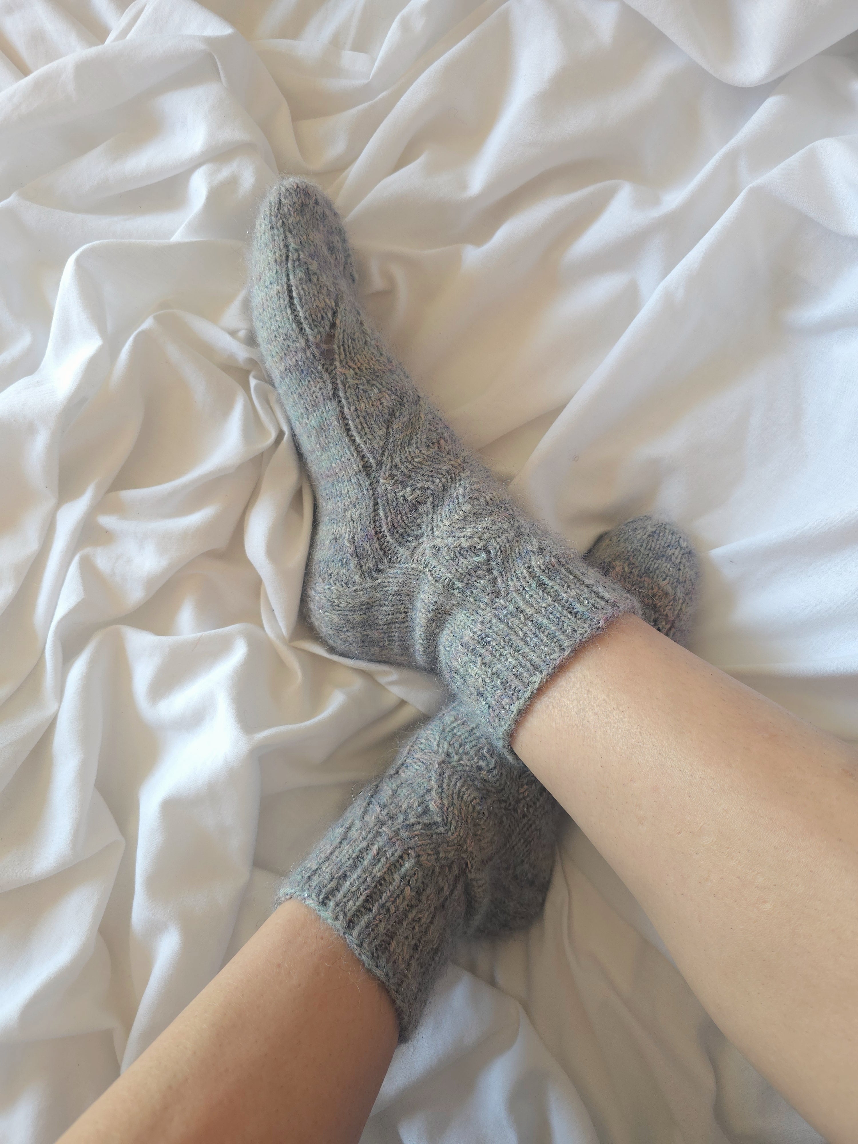 Icy blue woolen socks from hand dyed yarn. Foot size 23.5cm