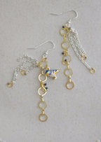 Chain earrings with blue bird pendant. Silver hooks