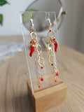 Dangle earrings with spicy chili pepper charm