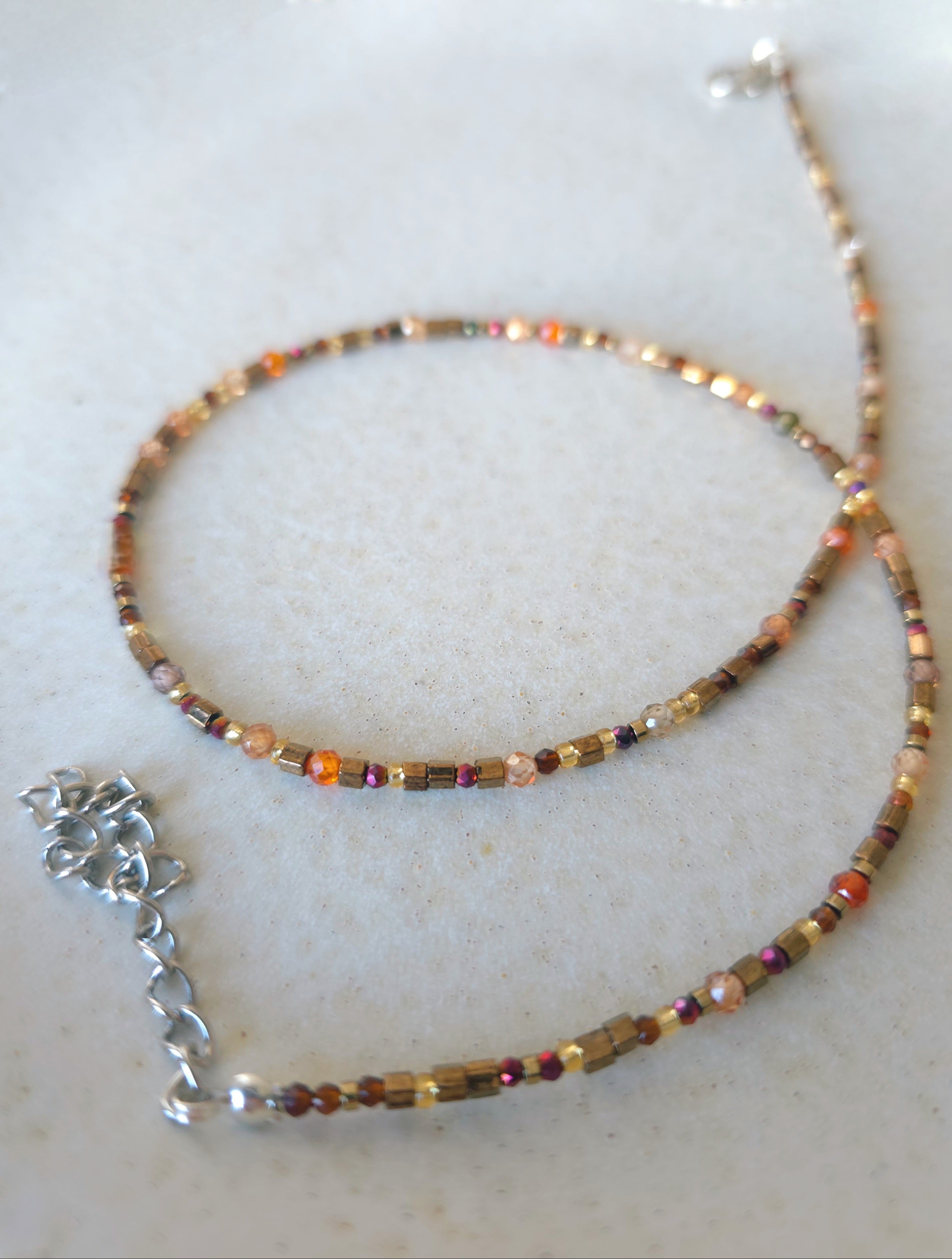 Beaded necklace in earthy shiny tones. Sweet gift for women