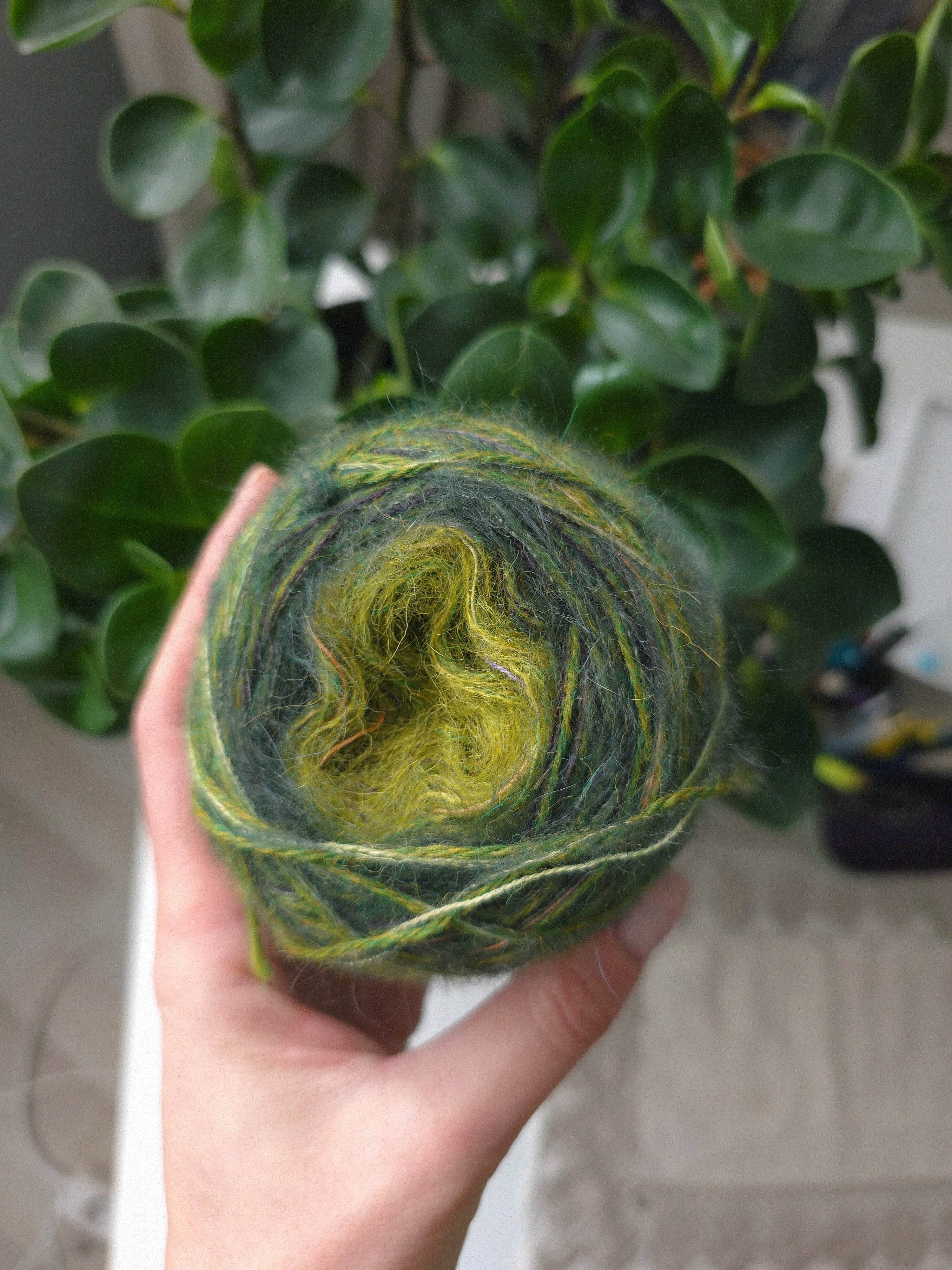 Forest green fingerless woolen gloves